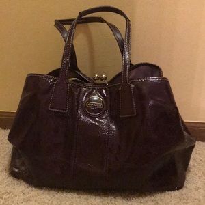 Purple patent leather coach bag